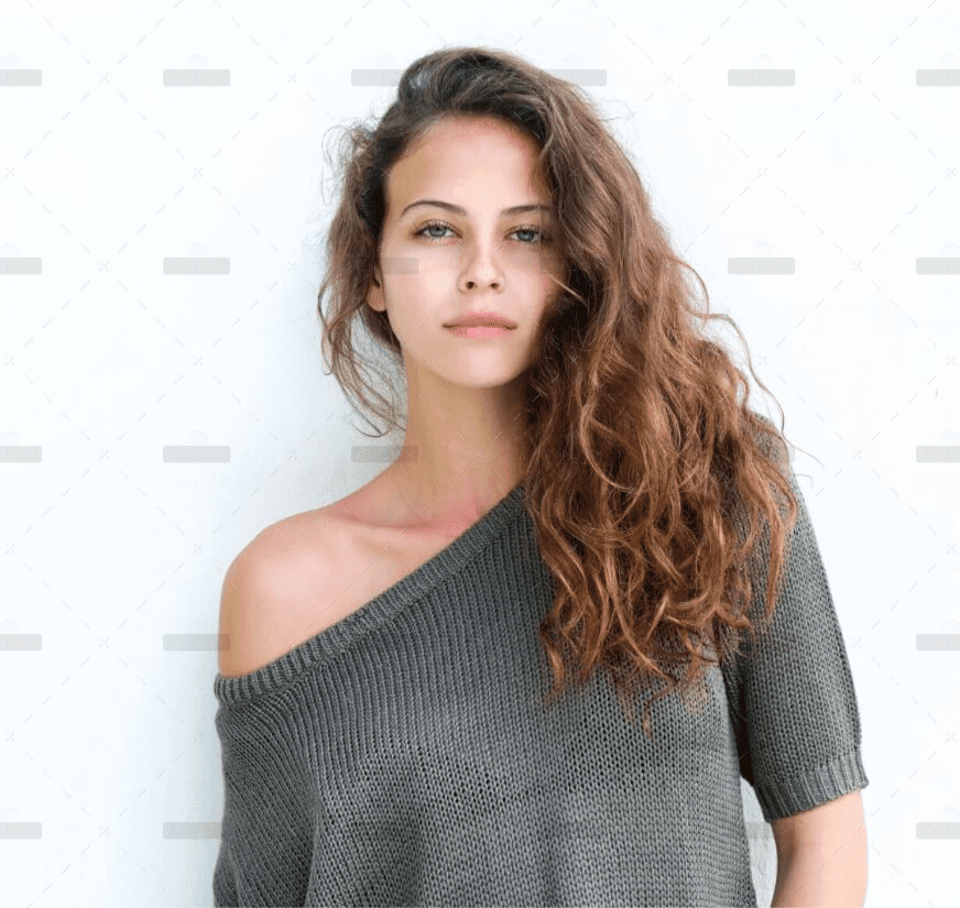 demo-attachment-836-attractive-confident-woman-standing-against-white-PX2A5SQ